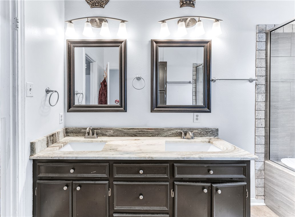 1220 Haley Place College Station, TX 77845 - Photo 7 of 20 a bathroom with a sink and a mirror