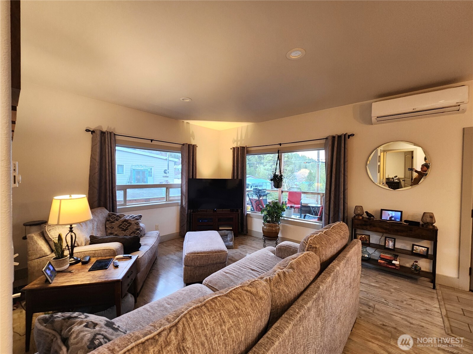 1054 Lower Madison Street Republic, WA 99166 - Photo 6 of 19 a living room with furniture and a flat screen tv