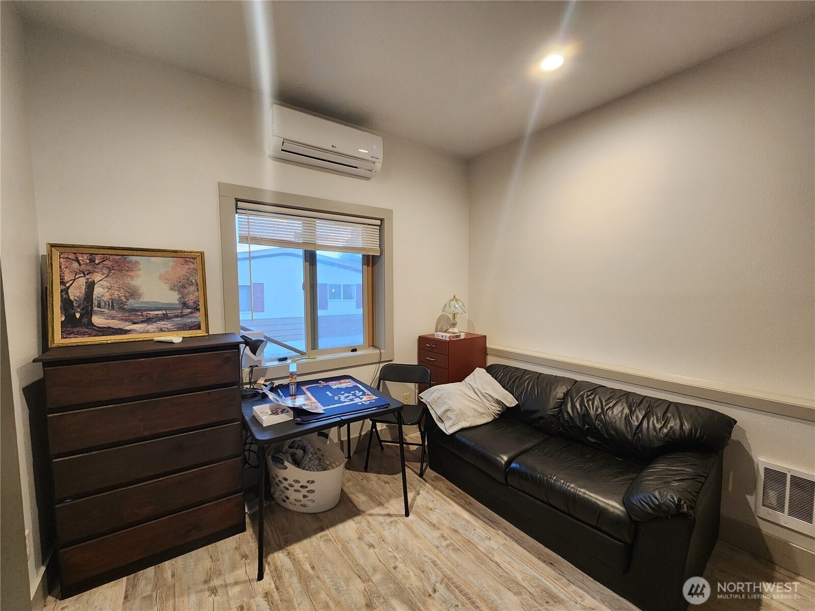 1054 Lower Madison Street Republic, WA 99166 - Photo 10 of 19 a living room with furniture and a window