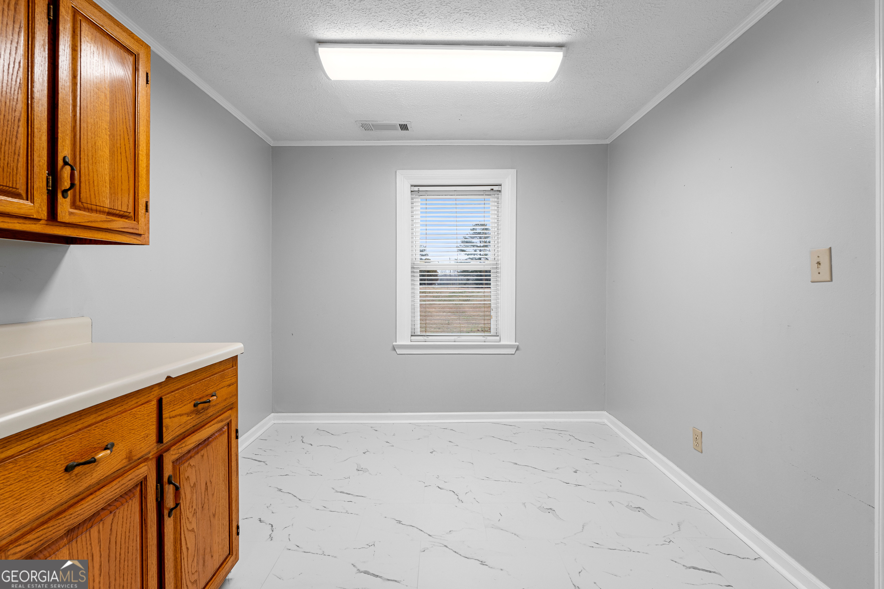 1330 Dunn Road Molena, GA 30258 - Photo 18 of 56 a view of storage and utility room with window