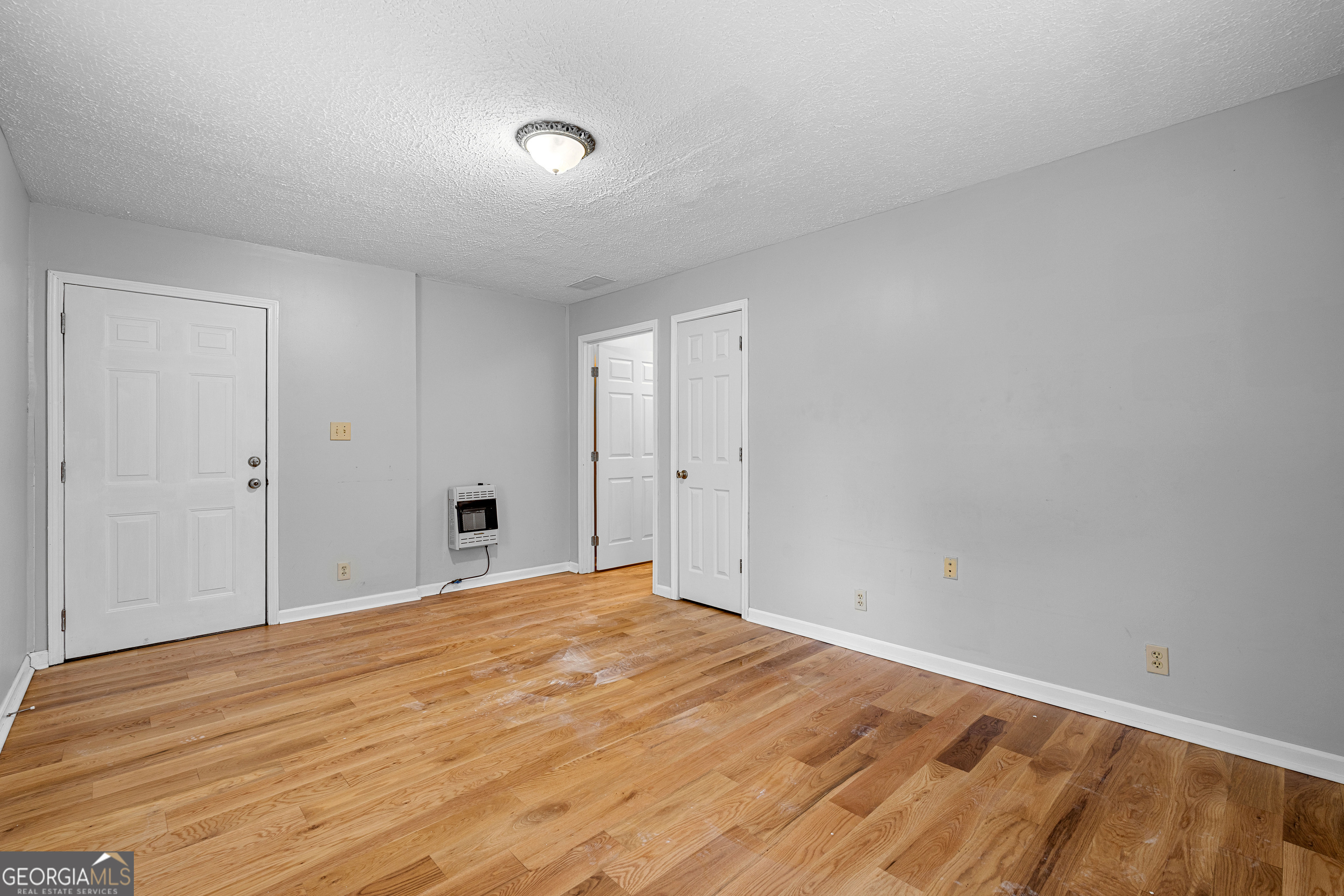 1330 Dunn Road Molena, GA 30258 - Photo 27 of 56 a view of empty room with wooden floor