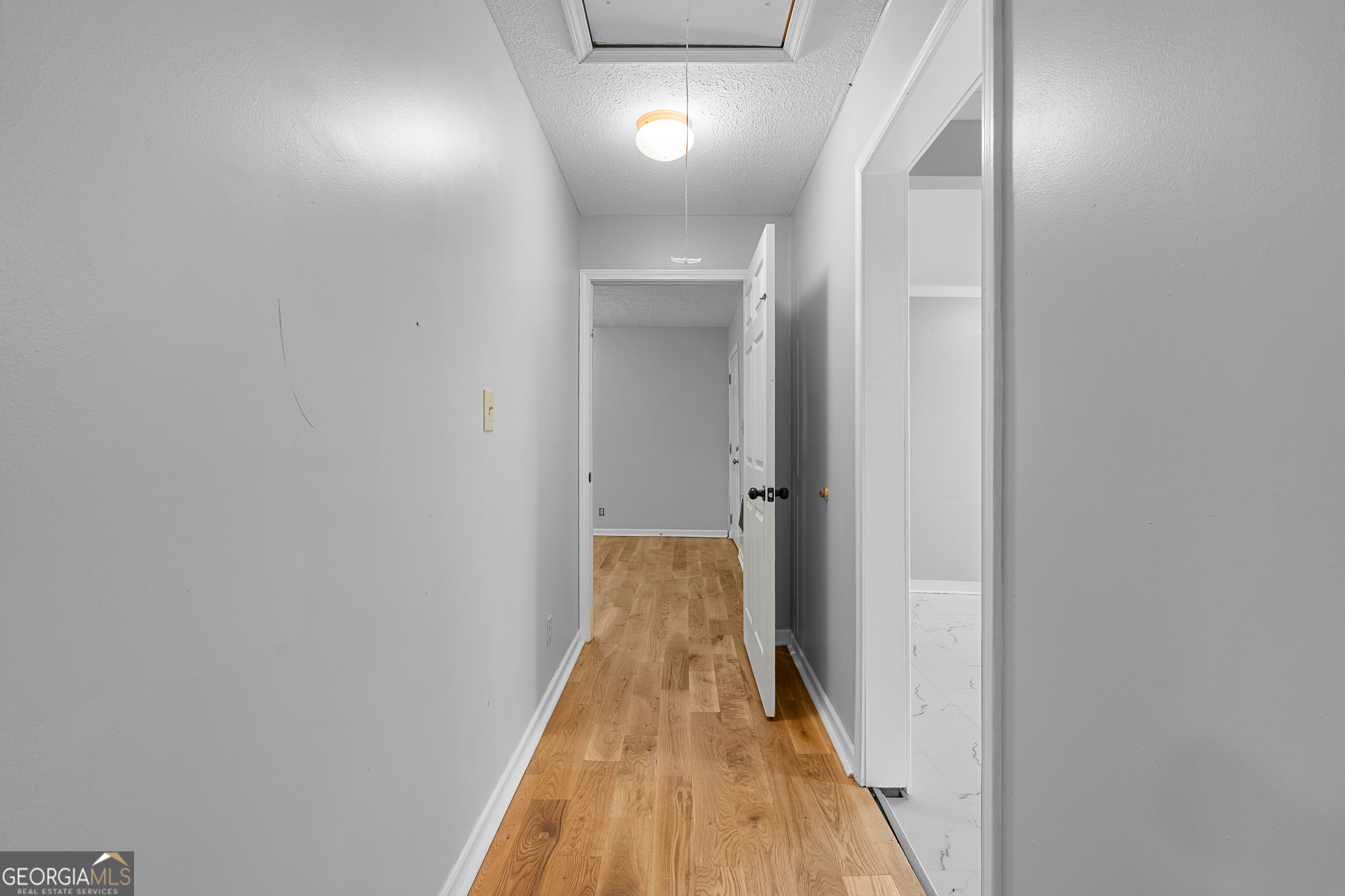 1330 Dunn Road Molena, GA 30258 - Photo 28 of 56 a view of a hallway with wooden floor