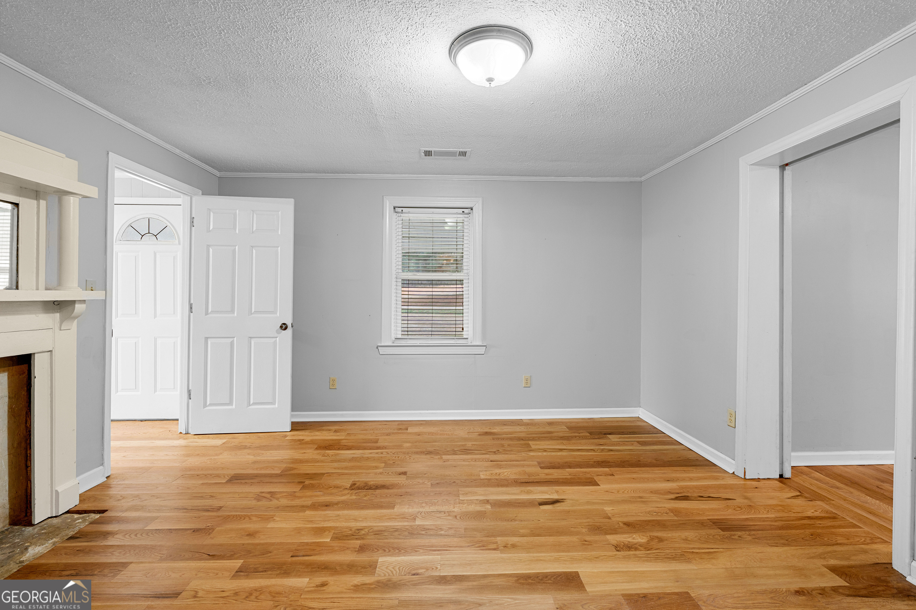 1330 Dunn Road Molena, GA 30258 - Photo 35 of 56 a view of an empty room with wooden floor