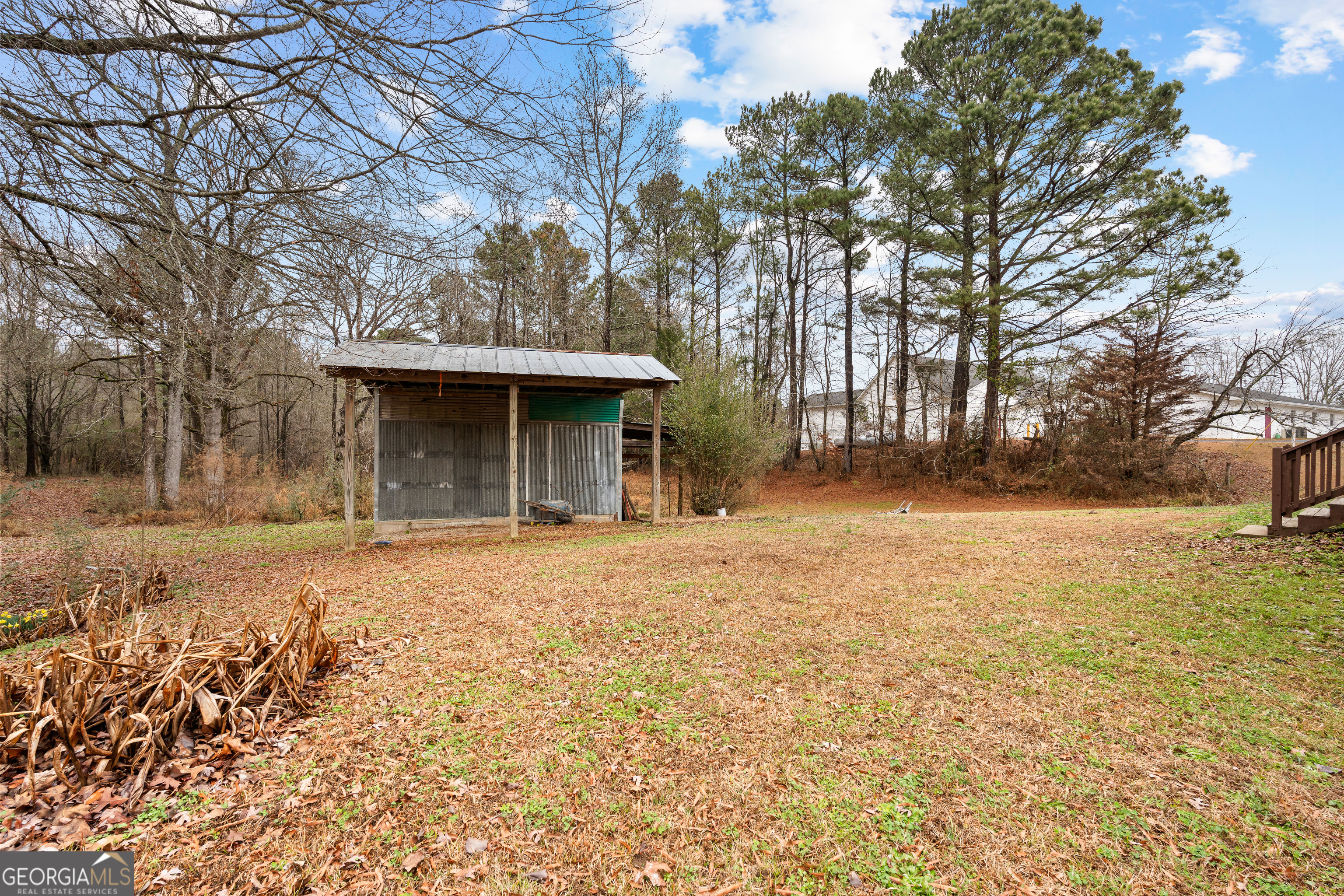 1330 Dunn Road Molena, GA 30258 - Photo 45 of 56 a front view of a house with a yard and garage