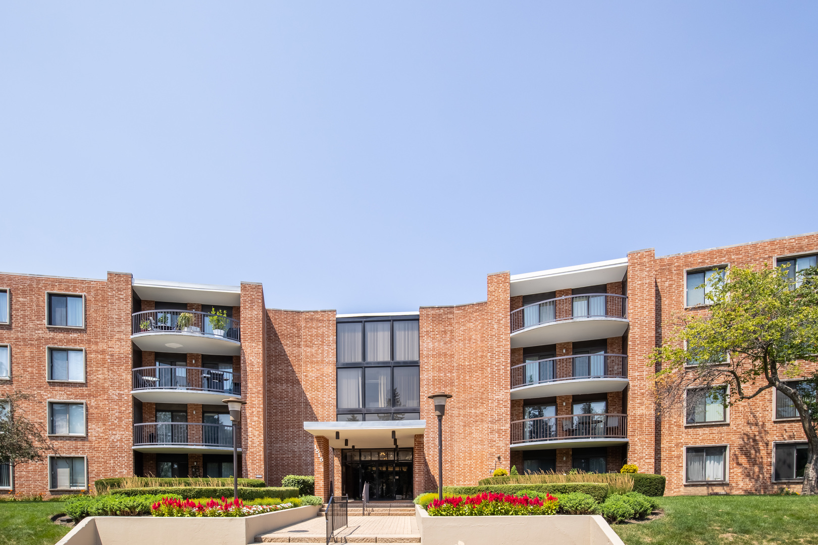 1515 East Central Road, Unit 258A Arlington Heights, IL 60005 - Photo 1 of 5 a front view of a building with street view