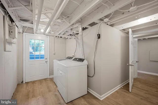 a view of a storage & utility room with racks on the wall