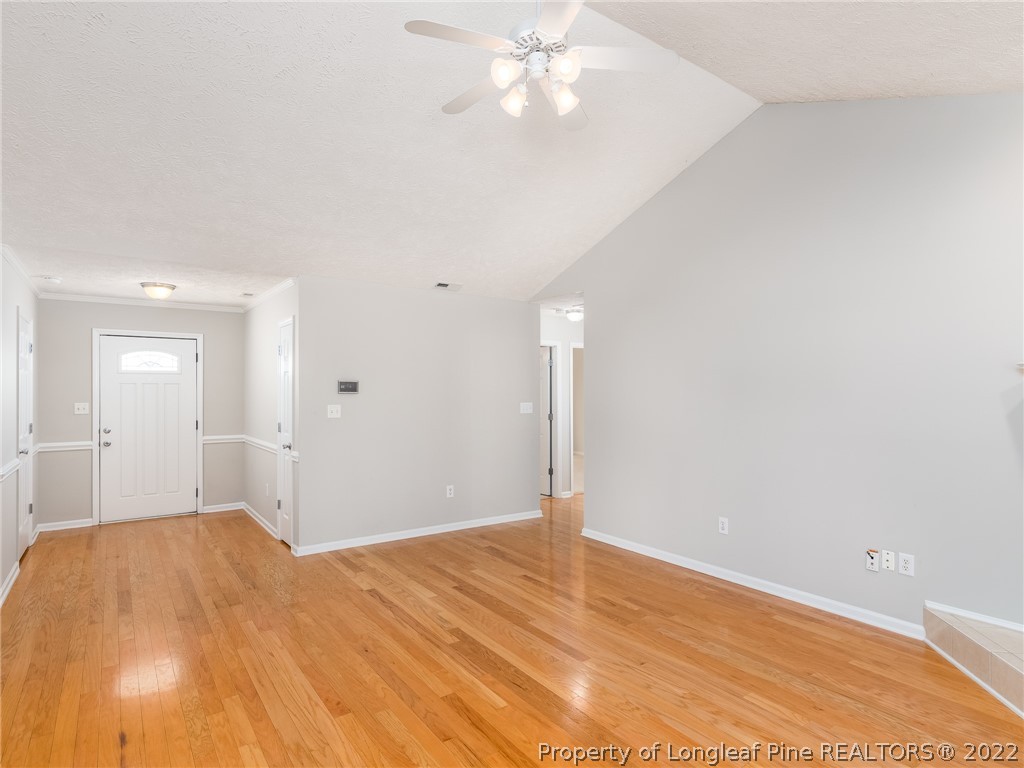 5716 Spreading Branch Road Hope Mills, NC 28348 - Photo 13 of 37 a view of a big room with wooden floor and closet