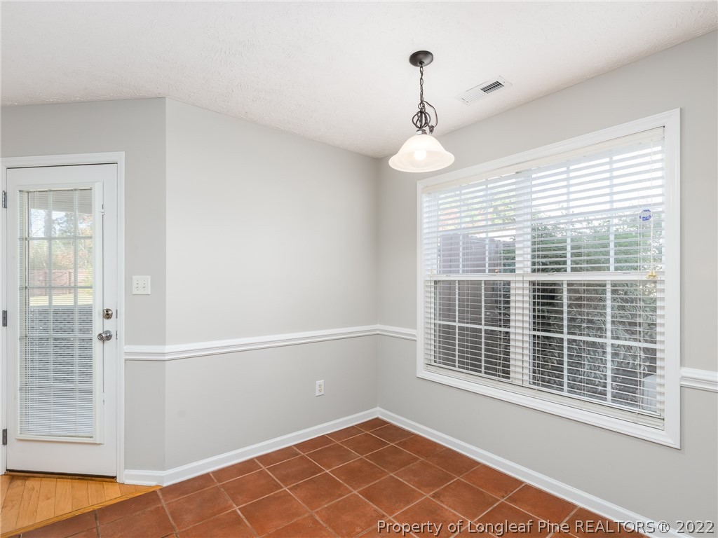 5716 Spreading Branch Road Hope Mills, NC 28348 - Photo 22 of 37 a view of an empty room with a window