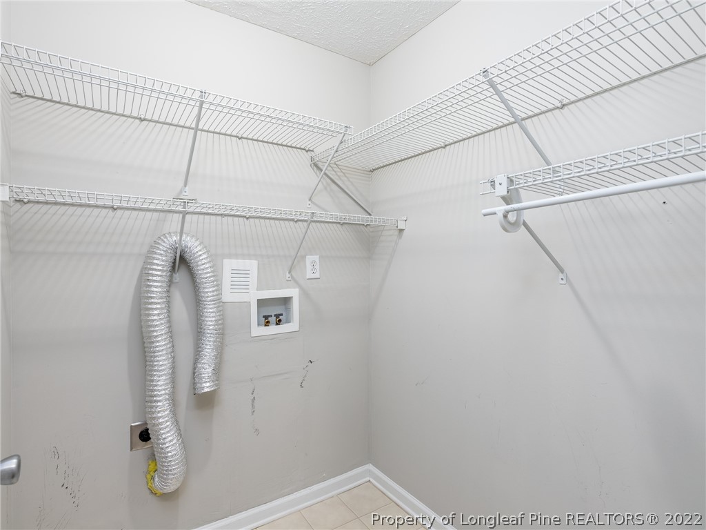 5716 Spreading Branch Road Hope Mills, NC 28348 - Photo 24 of 37 a bathroom with a shower