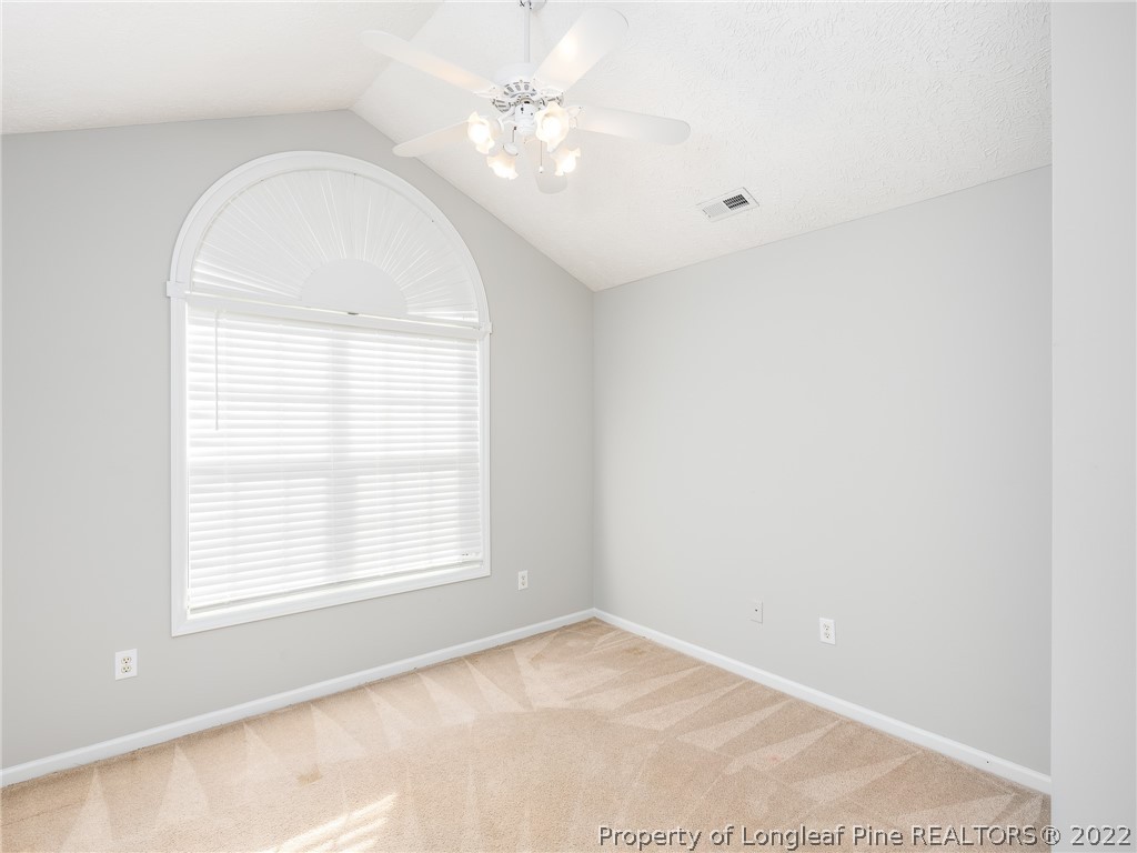 5716 Spreading Branch Road Hope Mills, NC 28348 - Photo 25 of 37 an empty room with a window