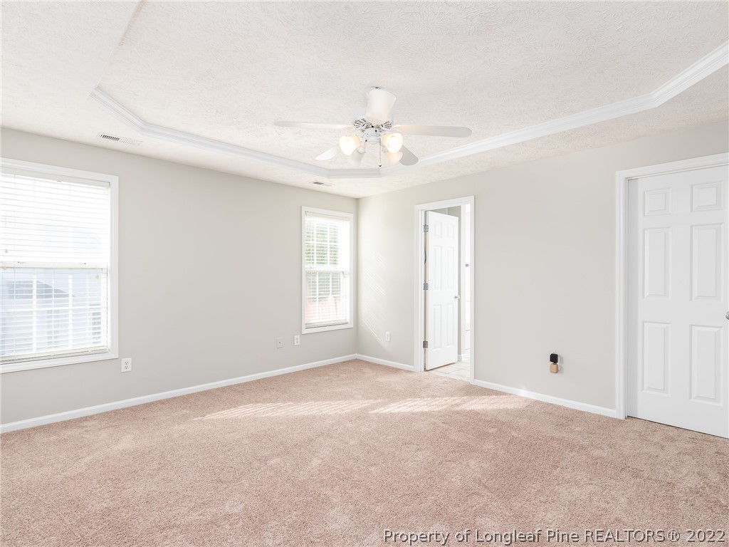 5716 Spreading Branch Road Hope Mills, NC 28348 - Photo 30 of 37 a view of an empty room with a window
