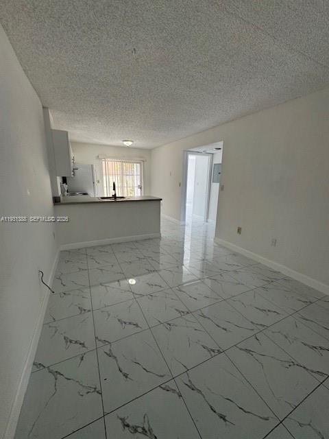 2750 Southwest 10th Terrace, Unit 4 Miami, FL 33135 - Photo 3 of 9 a view of kitchen and window