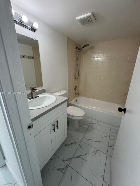 2750 Southwest 10th Terrace, Unit 4 Miami, FL 33135 - Photo 4 of 9 a bathroom with a sink a toilet and shower