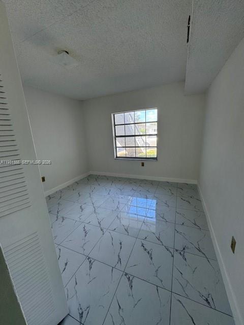 2750 Southwest 10th Terrace, Unit 4 Miami, FL 33135 - Photo 6 of 9 an empty room with windows