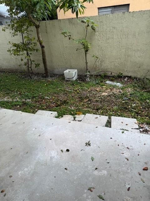 2750 Southwest 10th Terrace, Unit 4 Miami, FL 33135 - Photo 7 of 9 a view of a backyard of a house