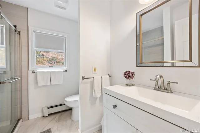 $1,199,999 | 4 Wooded Lane, Hampton Bays, NY 11946