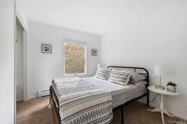 $1,199,999 | 4 Wooded Lane, Hampton Bays, NY 11946