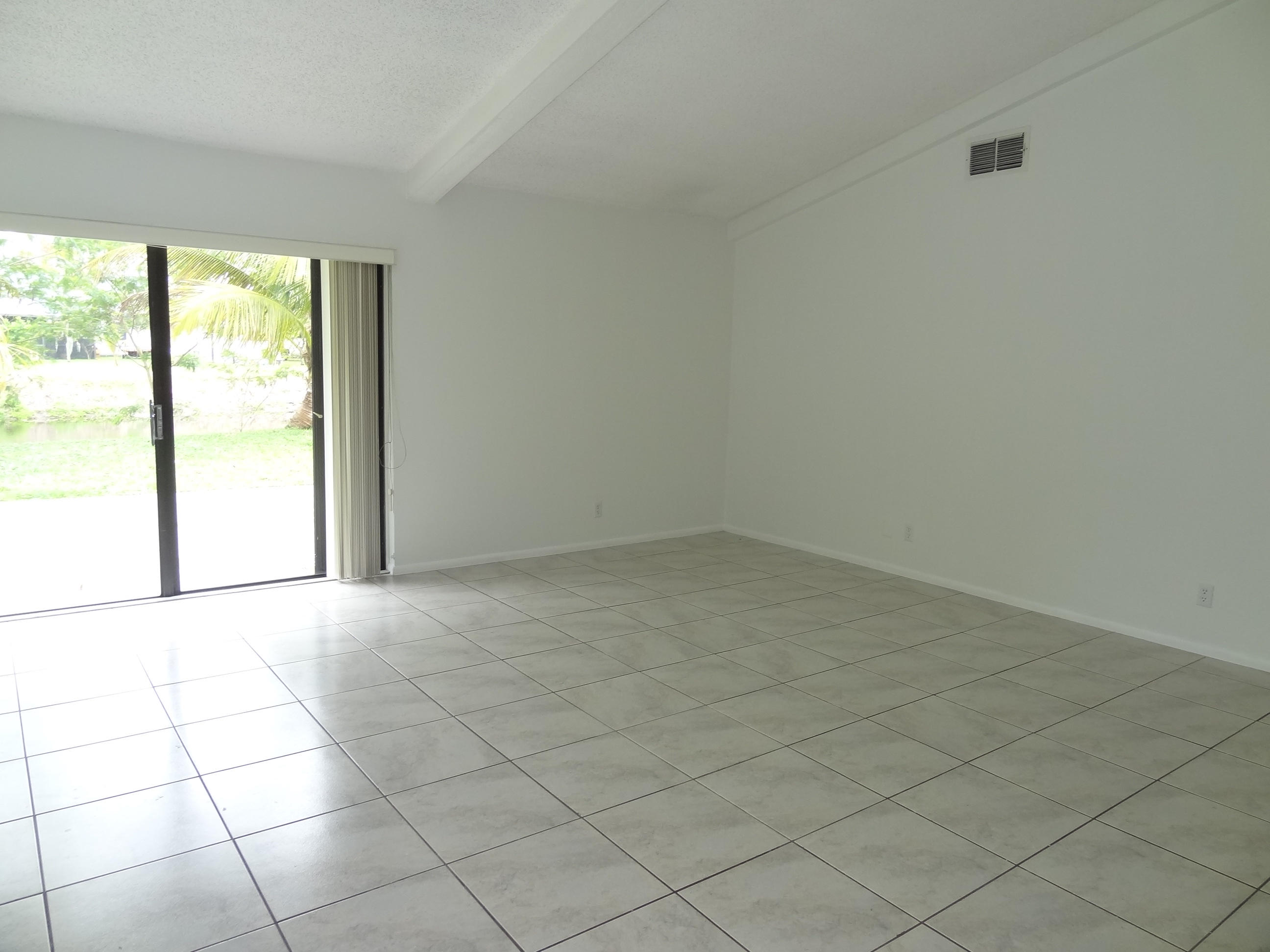 9781 Alaska Circle Boca Raton, FL 33434 - Photo 6 of 39 LIVING ROOM W/VAULTED CEILINGS & TILE