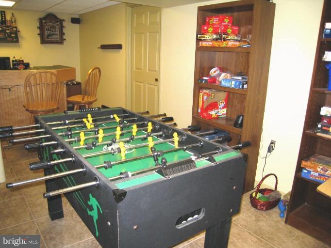 757 Hawthorne Road Linthicum Heights, MD 21090 - Photo 16 of 23 a room with gym equipment