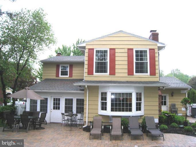 757 Hawthorne Road Linthicum Heights, MD 21090 - Photo 21 of 23 a front view of a house with a porch
