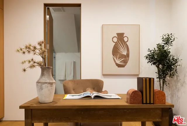 a close view of dining table with wooden floor