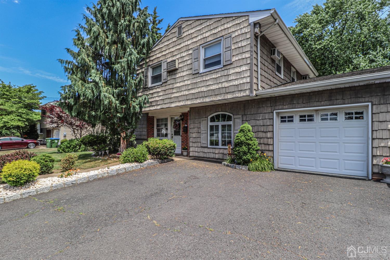 32 Monaghan Road Edison, NJ 08817 - Photo 1 of 35 a view of a house with a garage