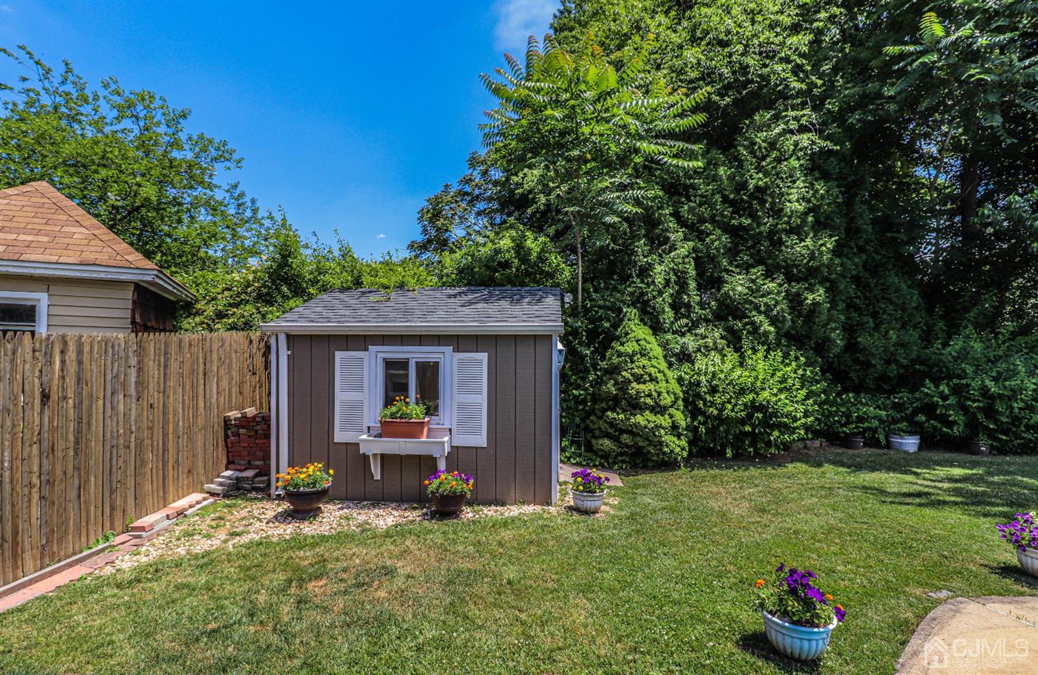 32 Monaghan Road Edison, NJ 08817 - Photo 35 of 35 a view of backyard with deck and garden