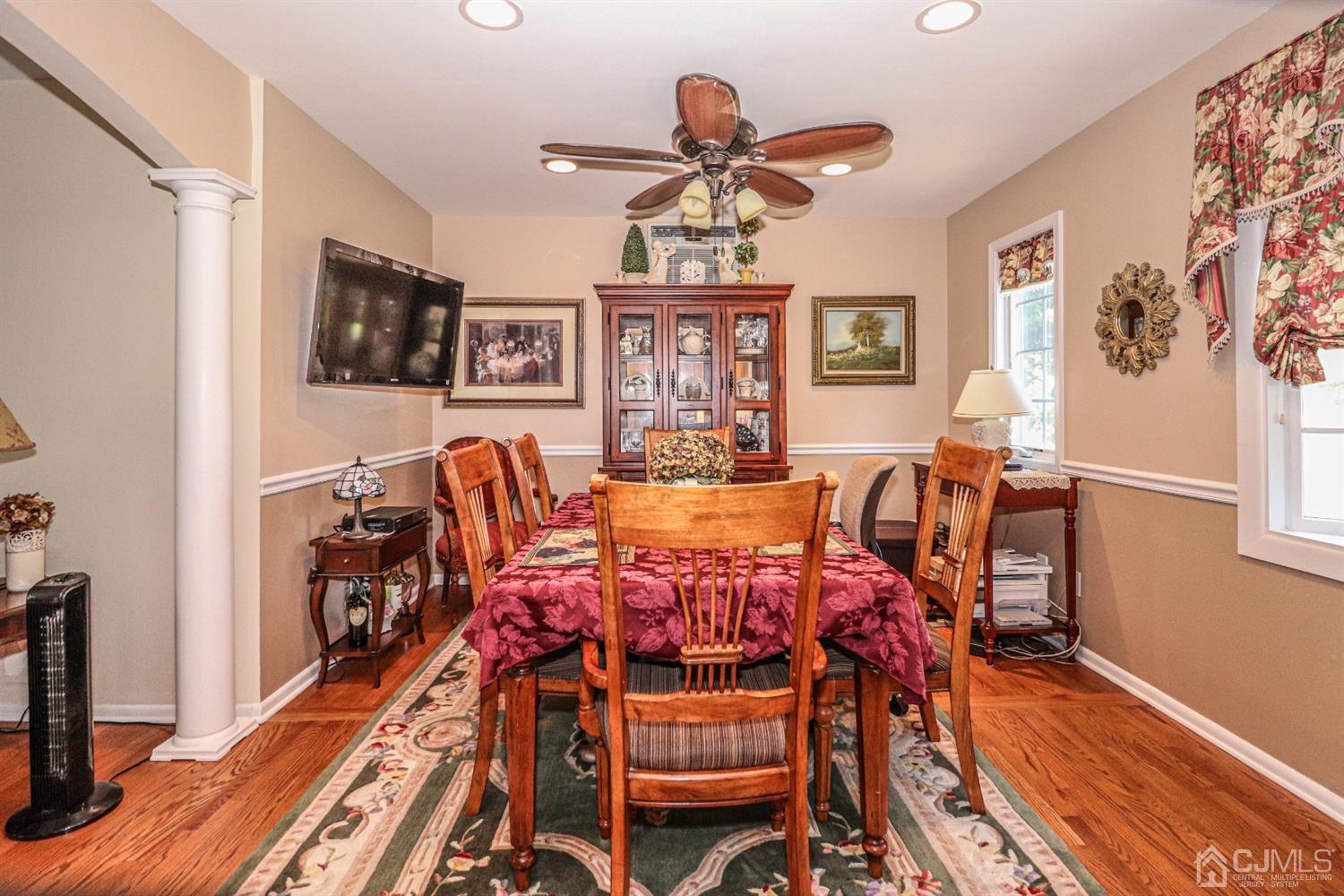 32 Monaghan Road Edison, NJ 08817 - Photo 6 of 35 a view of a dining room with furniture a chandelier and wooden floor