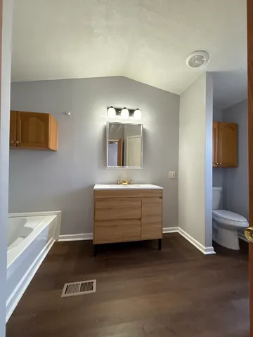 a bathroom with a sink and a bathtub