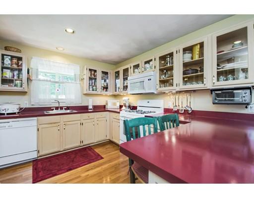 82 Elm Ridge Road Stow, MA 01775 - Photo 7 of 14 a kitchen with stainless steel appliances granite countertop a sink and cabinets