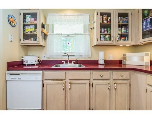 82 Elm Ridge Road Stow, MA 01775 - Photo 8 of 14 a kitchen with a sink cabinets and window