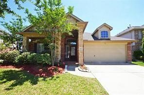 25411 Overbrook Terrace Lane Katy, TX 77494 - Photo 1 of 30 Beautiful landscaped front yard greets you as you drive up to this elegant home.
