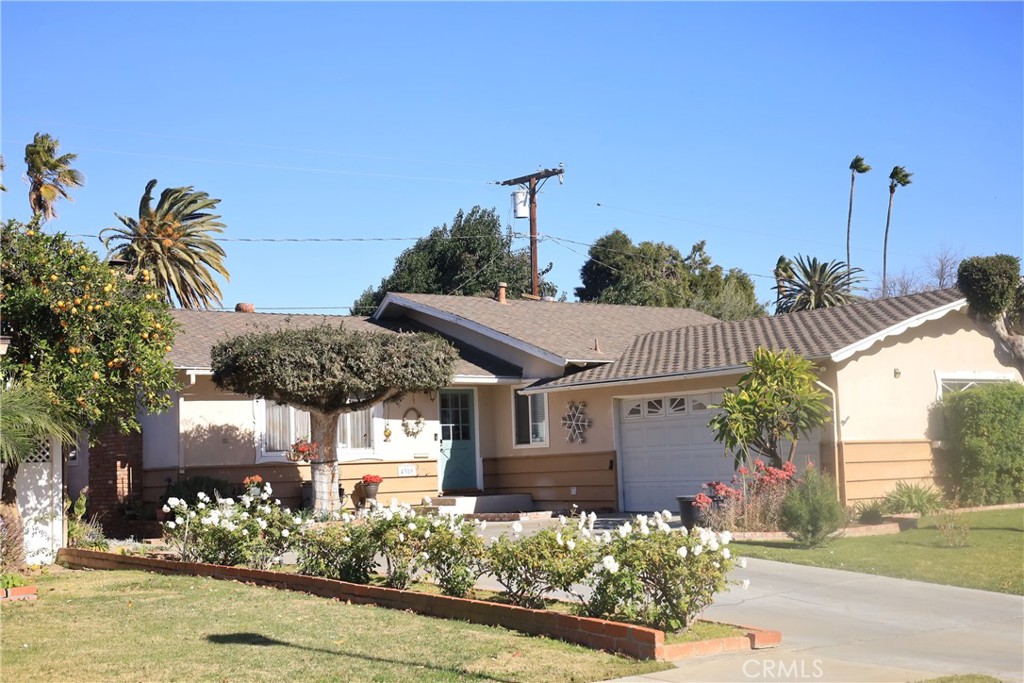 4389 Beverly Court Riverside, CA 92506 - Photo 14 of 14 a front view of a house with garden