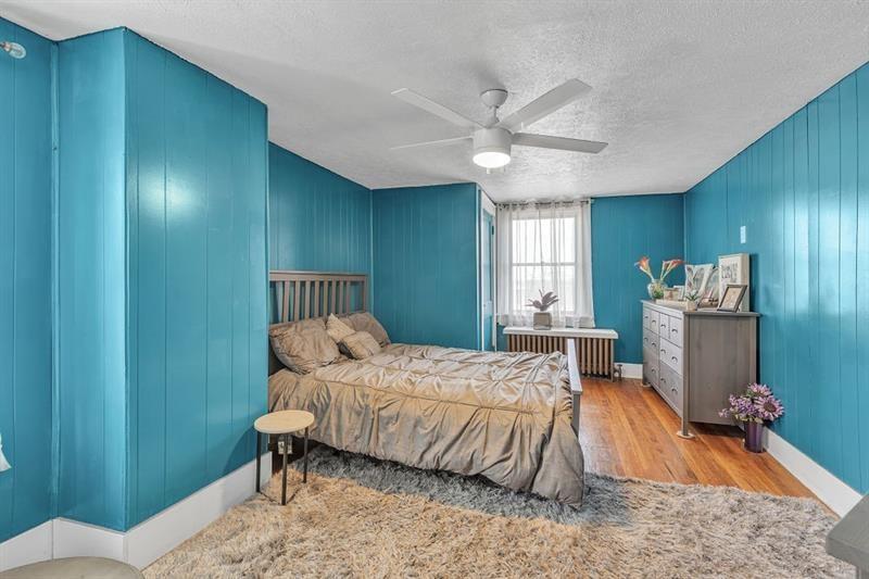 3159 Brodhead Road Aliquippa, PA 15001 - Photo 12 of 30 a bedroom with a bed and a dresser