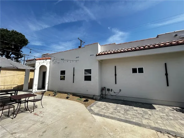 a view of a back yard of the house