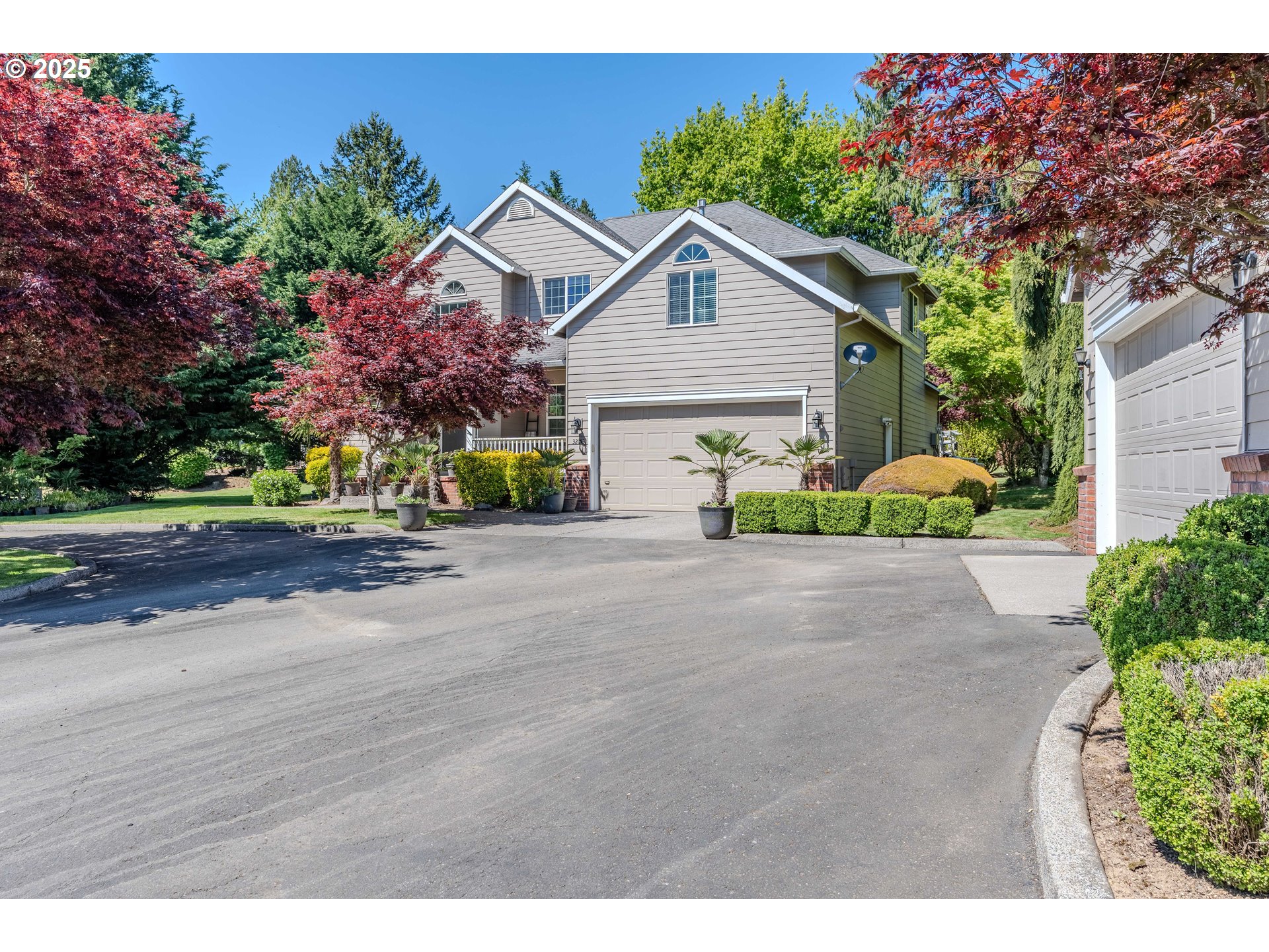 32153 Southeast Bluff Road Gresham, OR 97080 - Photo 2 of 48 a view of a house with a yard and potted plants
