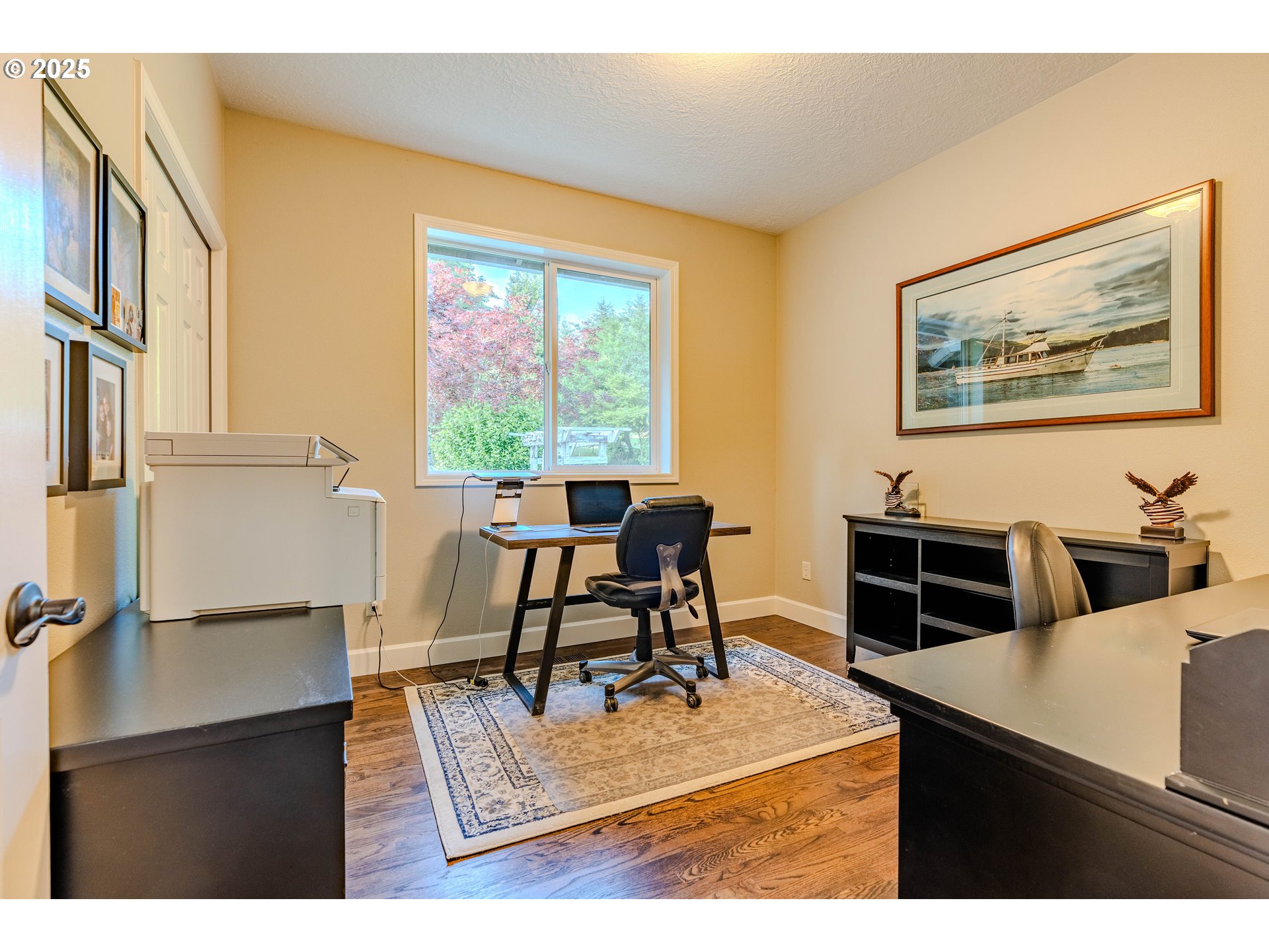 32153 Southeast Bluff Road Gresham, OR 97080 - Photo 24 of 48 a living room with furniture a large window and wooden floor
