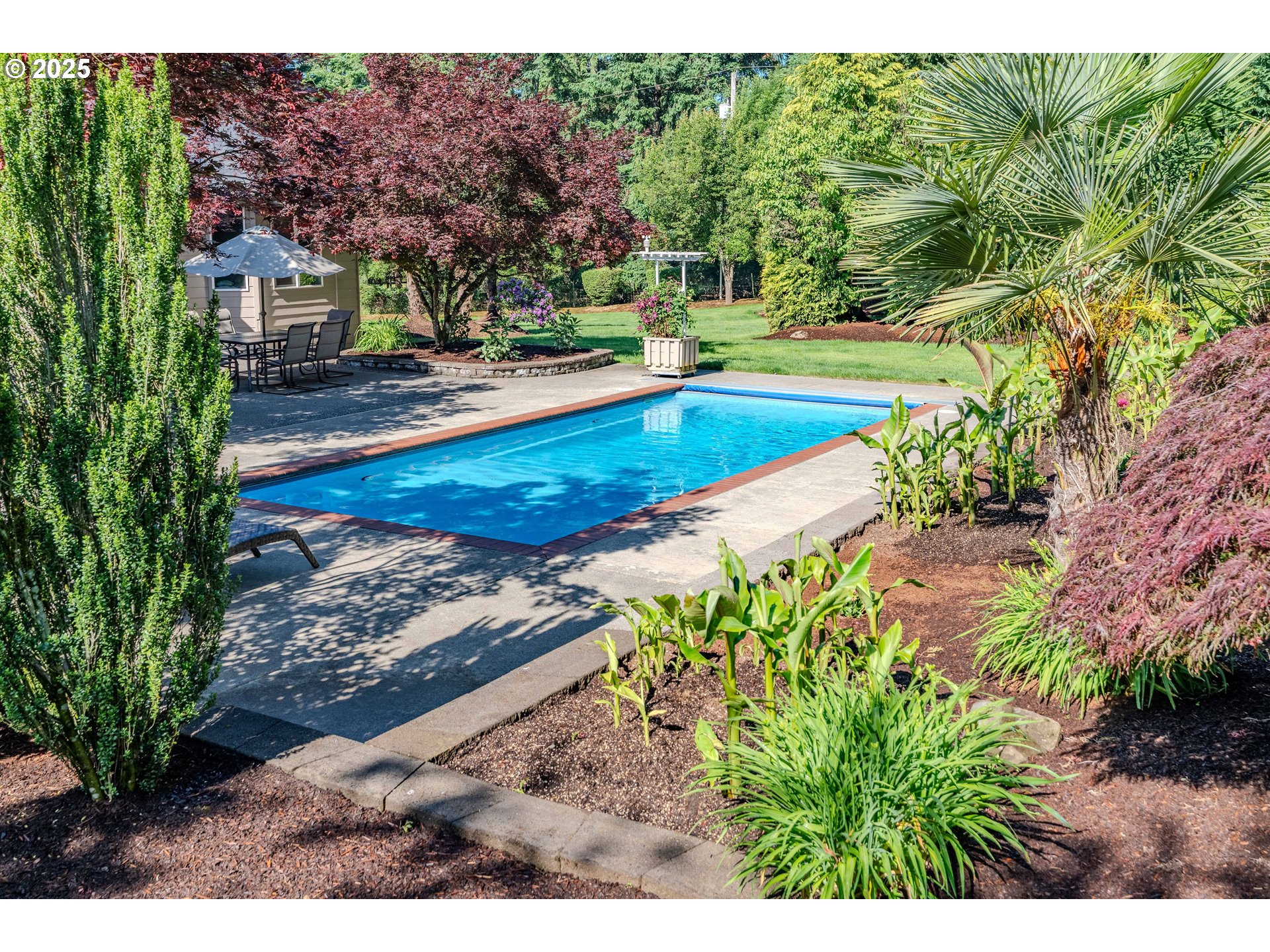 32153 Southeast Bluff Road Gresham, OR 97080 - Photo 38 of 48 a view of a backyard with swimming pool