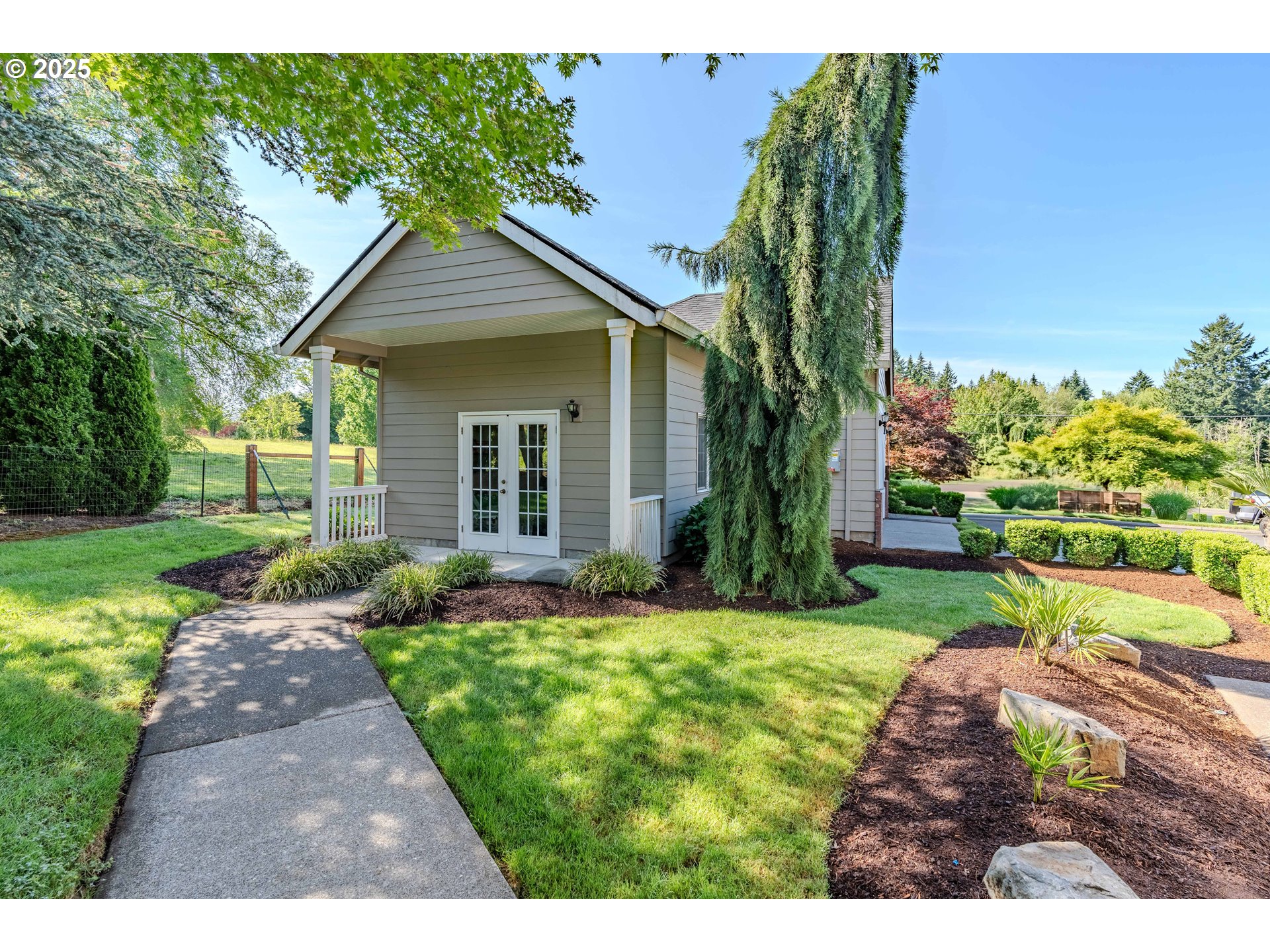 32153 Southeast Bluff Road Gresham, OR 97080 - Photo 47 of 48 a front view of a house with a yard