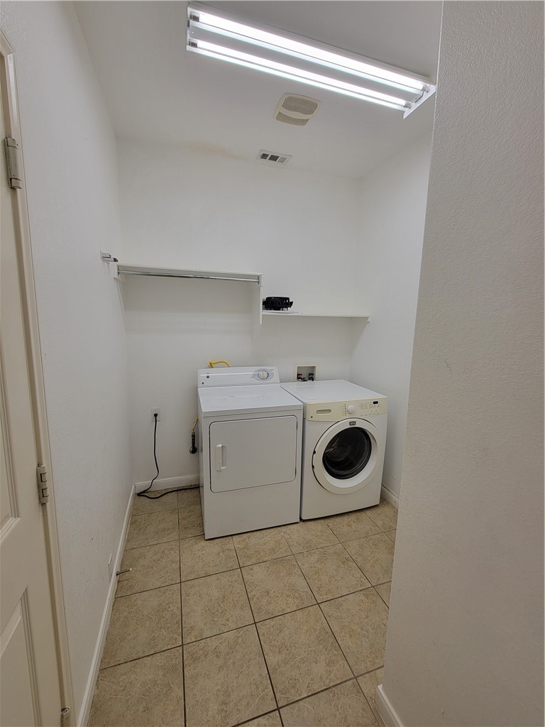 3526 Shiraz Loop Round Rock, TX 78665 - Photo 14 of 18 a utility room with dryer and washer