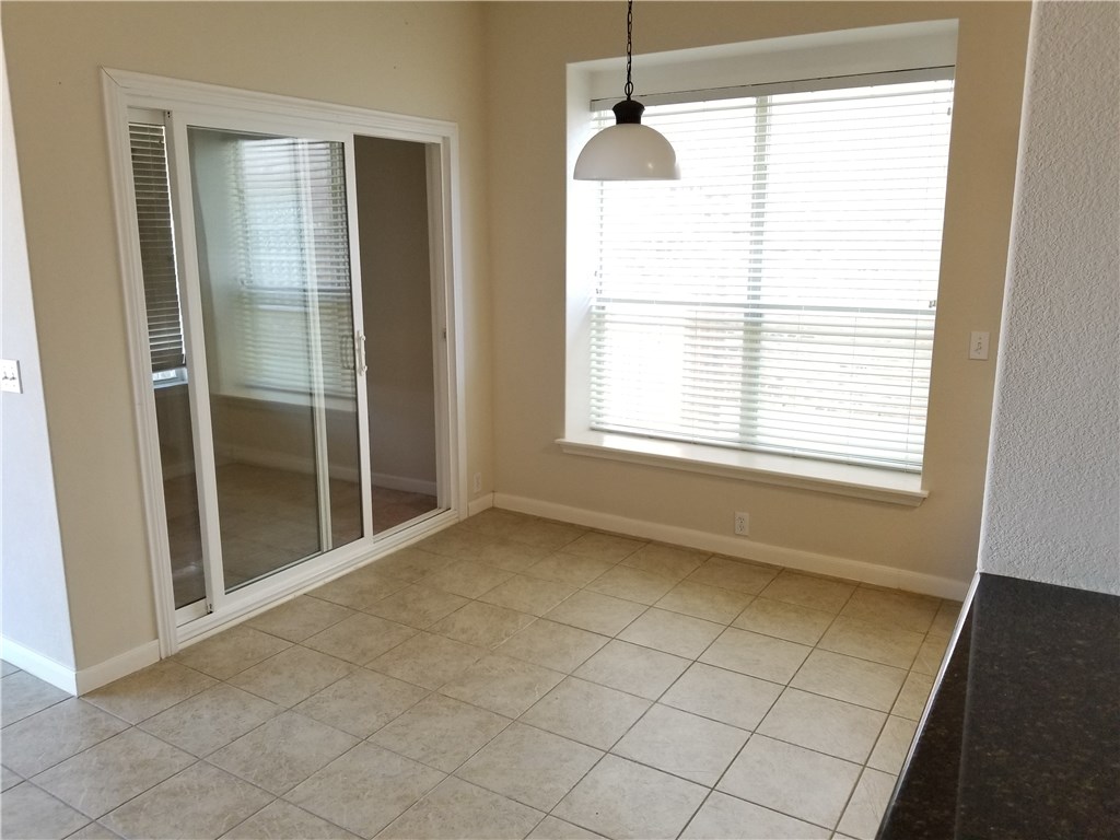 3526 Shiraz Loop Round Rock, TX 78665 - Photo 3 of 18 a view of an empty room with a window