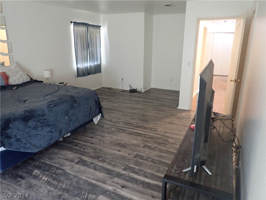 872 Adobe Flat Drive Henderson, NV 89011 - Photo 21 of 44 Large Primary Bedroom With Wood Laminate