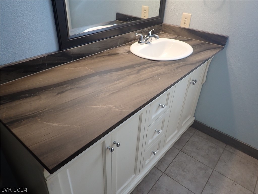 872 Adobe Flat Drive Henderson, NV 89011 - Photo 27 of 44 Remodeled Primary Bathroom/Leather Marble Finish