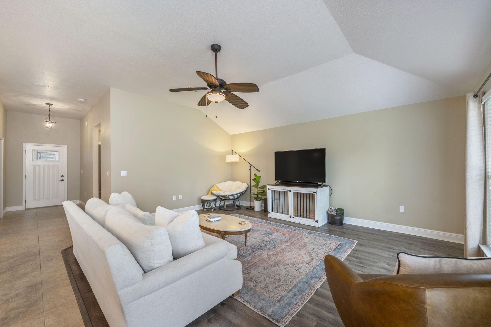 5811 Roberts Road Crestview, FL 32536 - Photo 11 of 35 a living room with furniture and a flat screen tv