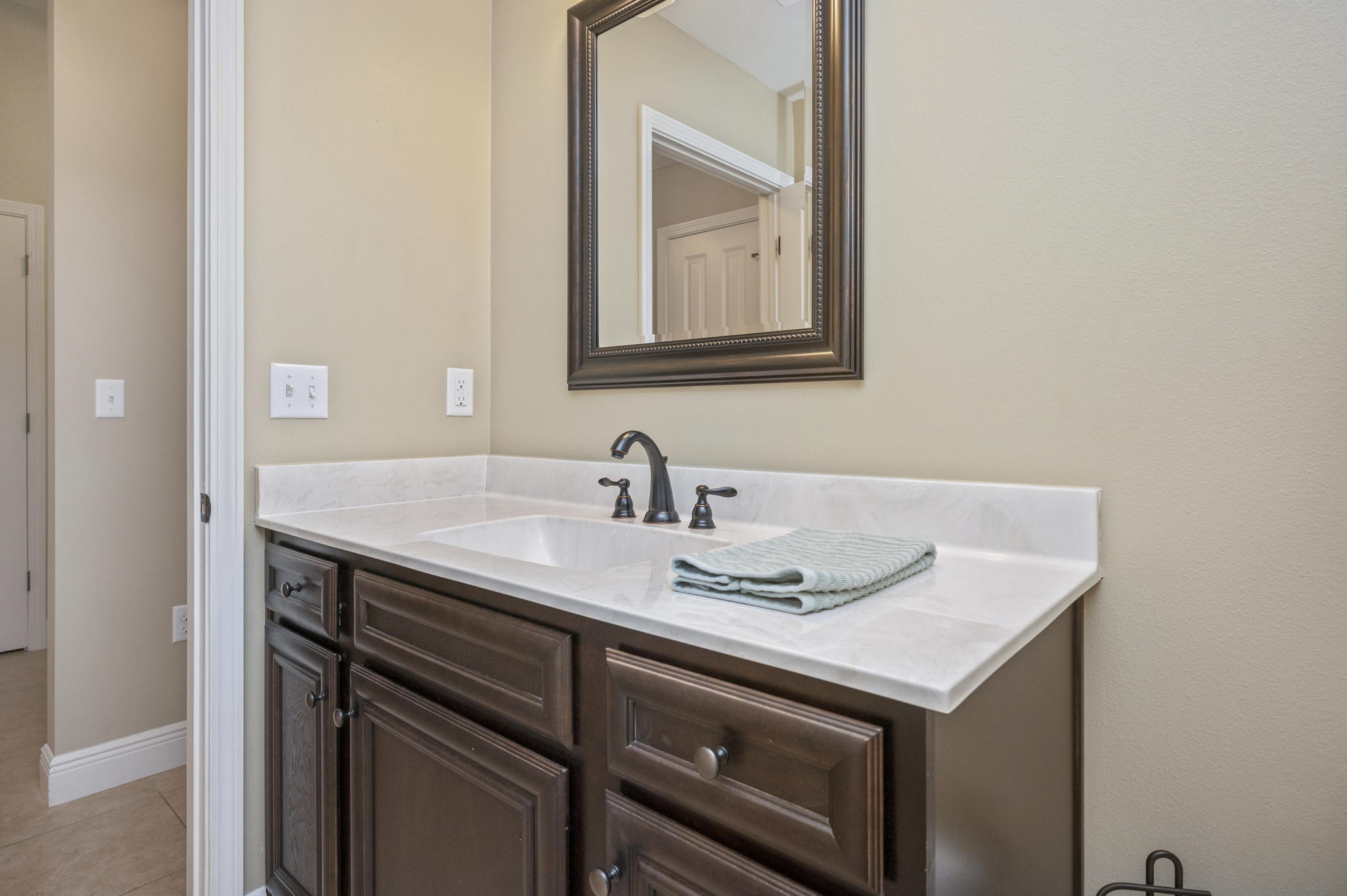 5811 Roberts Road Crestview, FL 32536 - Photo 27 of 35 a sink and a mirror