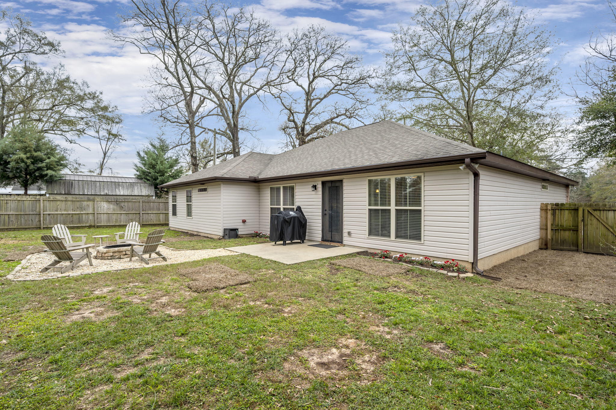 5811 Roberts Road Crestview, FL 32536 - Photo 4 of 35 a view of a house with a yard and sitting area