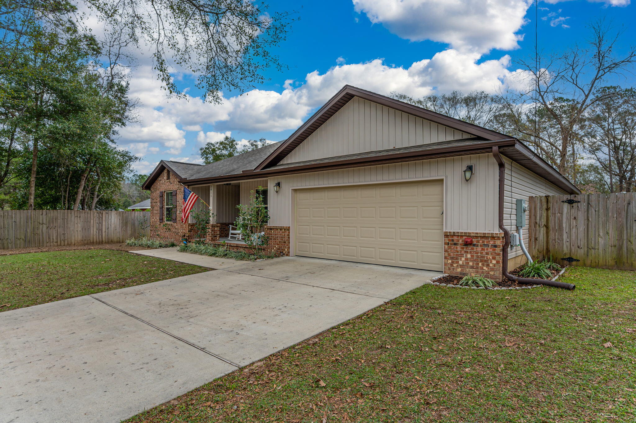 5811 Roberts Road Crestview, FL 32536 - Photo 8 of 35 a view of a house with yard and a garage