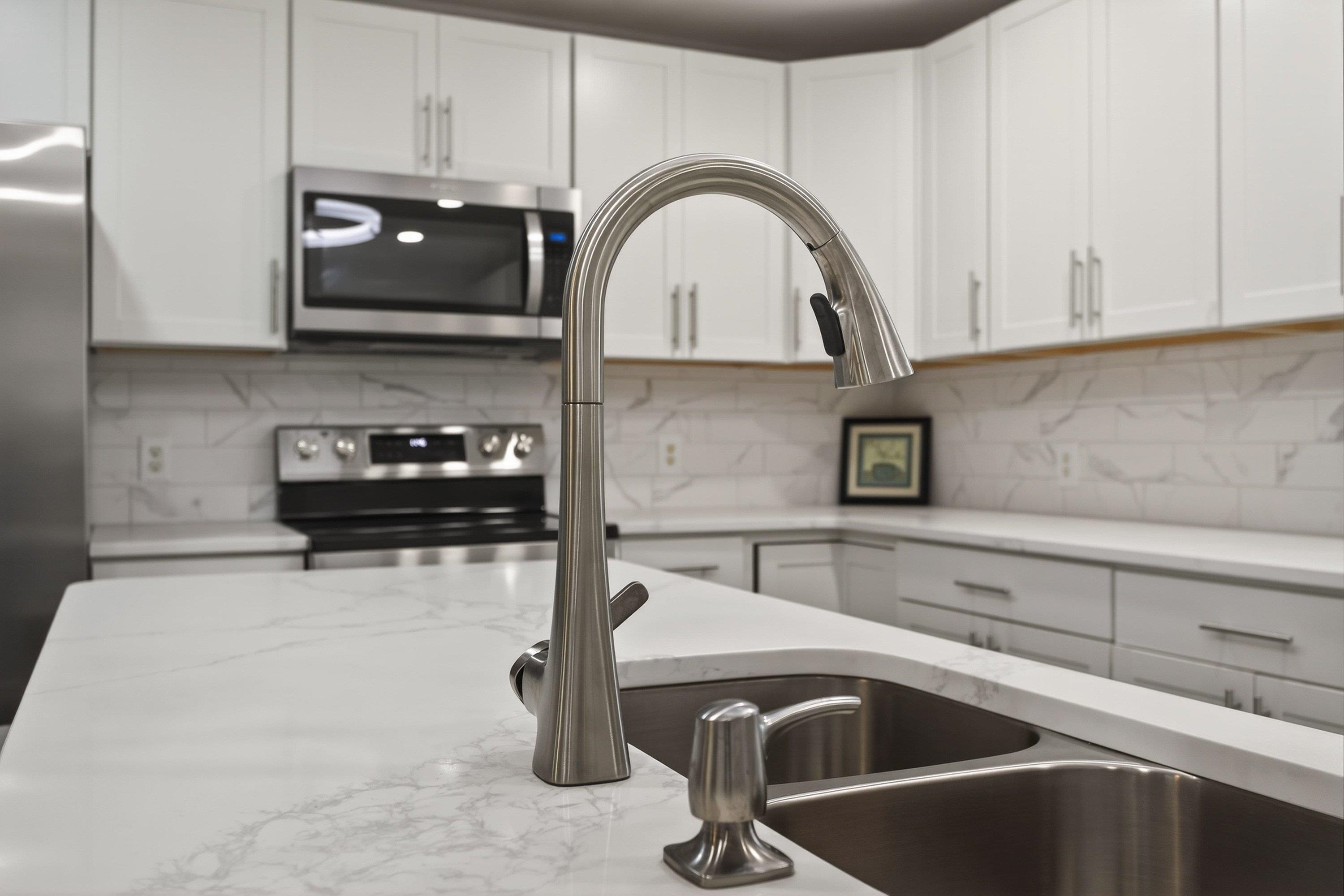 178 Suter Street Harrisonburg, VA 22802 - Photo 12 of 73 The completely renovated kitchen offers quartz counter-tops, luxury vinyl plank flooring, spacious kitchen island, white wooden cabinetry, recessed/modern light fixtures, and more!