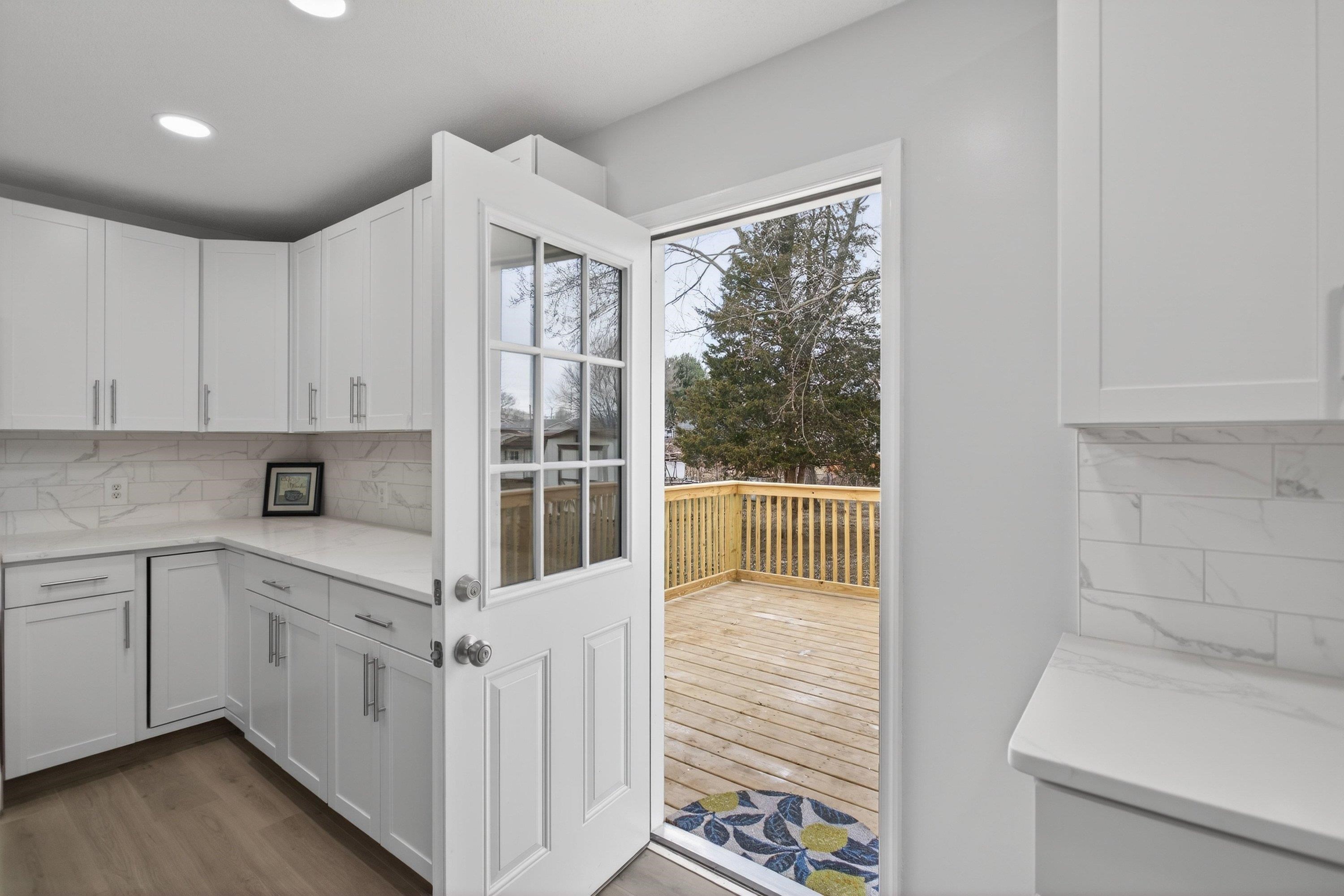 178 Suter Street Harrisonburg, VA 22802 - Photo 18 of 73 The completely renovated kitchen offers quartz counter-tops, luxury vinyl plank flooring, spacious kitchen island, white wooden cabinetry, recessed/modern light fixtures, and more!