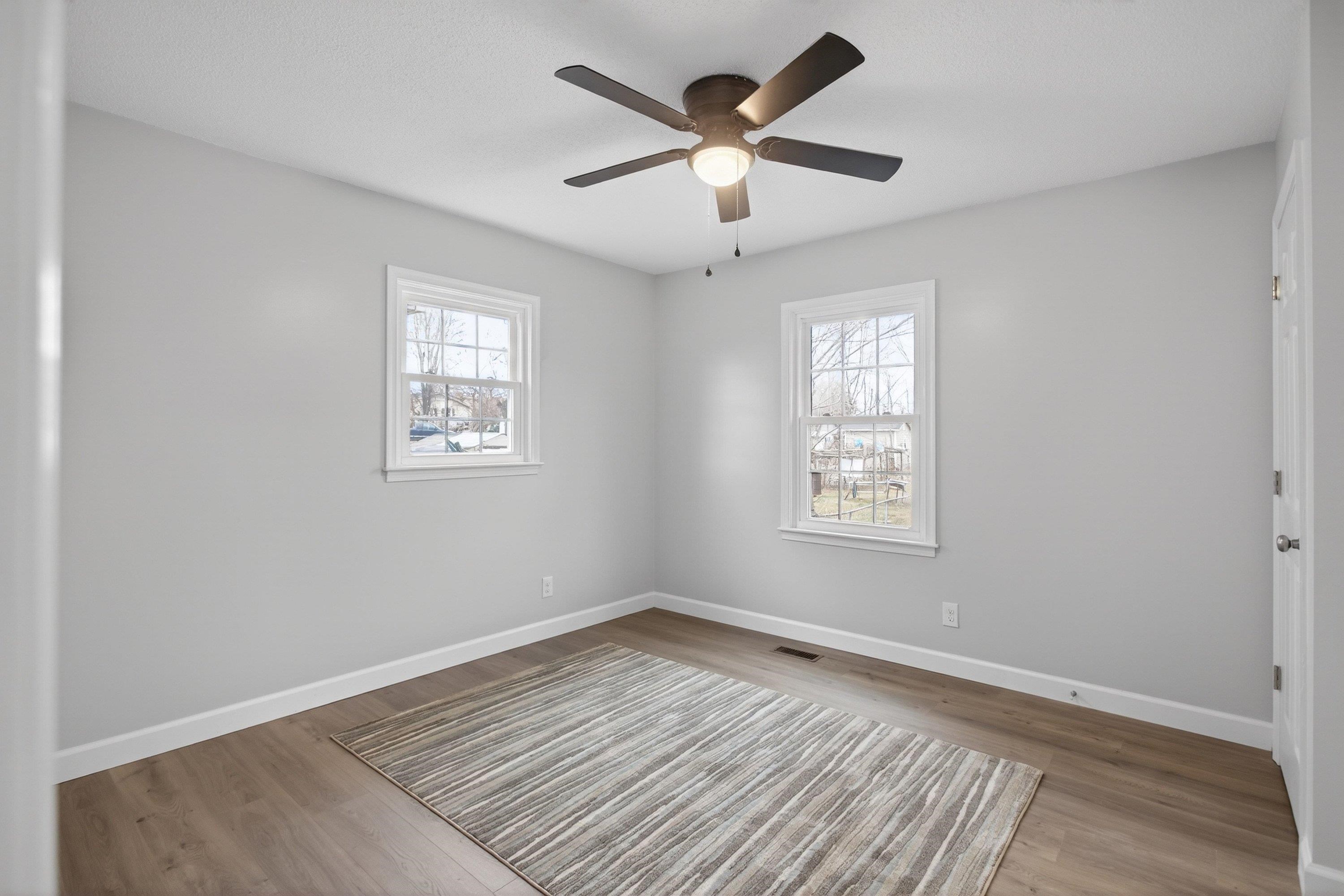 178 Suter Street Harrisonburg, VA 22802 - Photo 24 of 73 This large primary bedroom features luxury vinyl plank flooring, large windows, fresh paint, spacious closet area, and attached full bathroom!